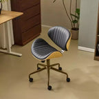 Fauteuil de bureau en PU incurvé avec piètement bronze antique